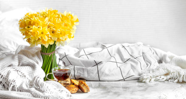 istock Spring flowers and blooms in a cozy home atmosphere. 1222612545