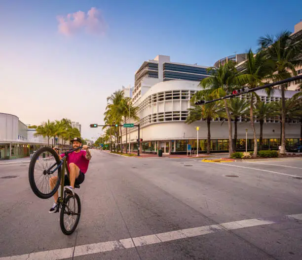 BMX style wheel up in an empty Miami Beach street