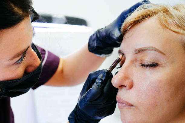 istock Brow Artist Styling And Plucking Woman's Brows In Beauty Salon. Selective Focus, Empty Space 1222617167