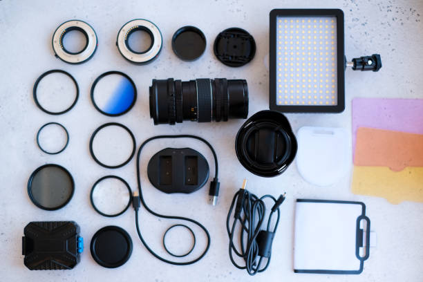istock Flat lay composition with equipment for professional photographer on grey background. 1222617232