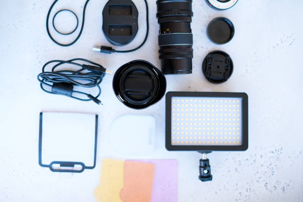 istock Flat lay composition with equipment for professional photographer on grey background. 1222617234