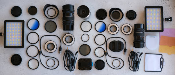 istock Flat lay composition with equipment for professional photographer on grey background. 1222617236