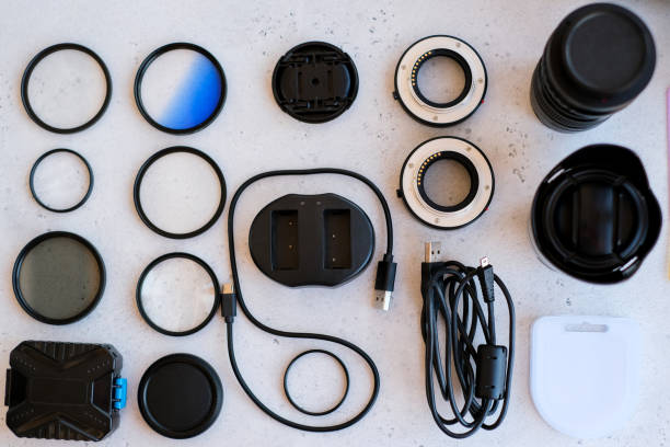 istock Flat lay composition with equipment for professional photographer on grey background. 1222617240