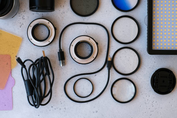 istock Flat lay composition with equipment for professional photographer on grey background. 1222617264