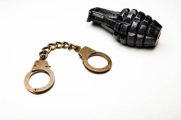 istock image of handcuffs pomegranate white background 1222617721
