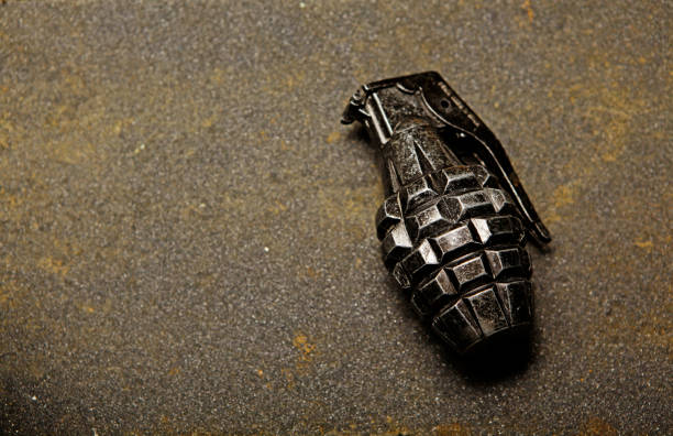 bild von granatapfelasphalt hintergrund - hand grenade stock-fotos und bilder