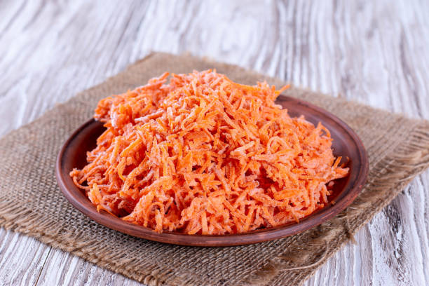 istock Frozen grated carrots in a plate 1222618479