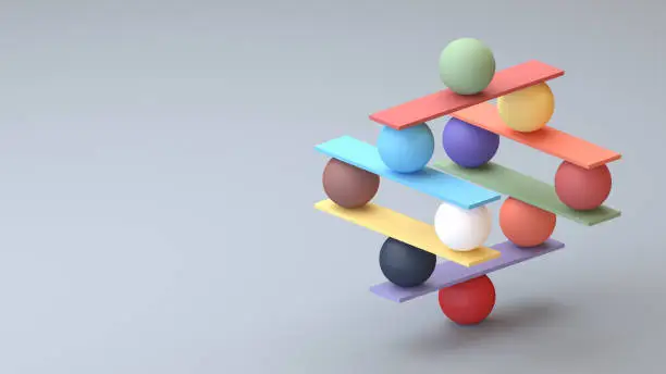 Photo of Jenga game color block tower with balls