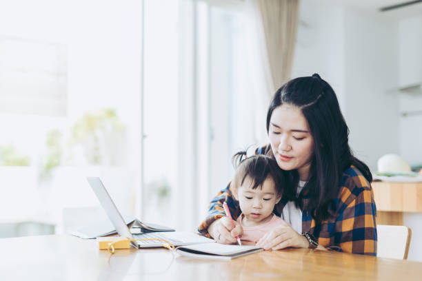 istock Mother Working At Home with a small Child 1222618888