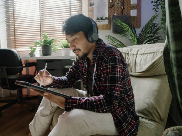 The New Normal : Asian graphic designer working from home