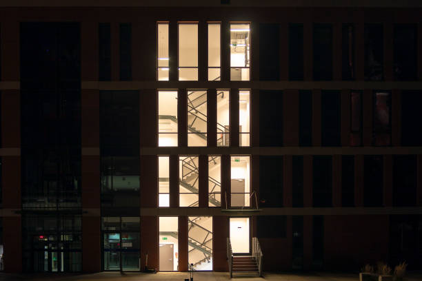 istock A building at night with an illuminated staircase. 1222622448