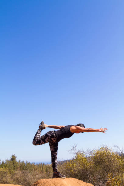 istock Mature Woman doing pilates exercises outsite 1222623260