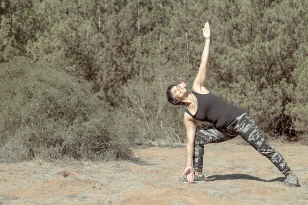 istock Mature Woman doing pilates exercises outsite 1222623480