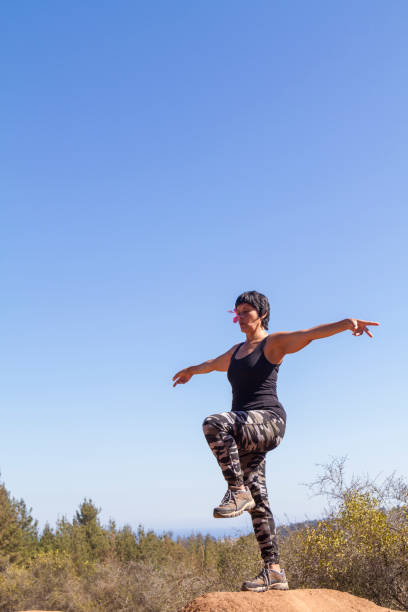 istock Mature Woman doing pilates exercises outsite 1222623487