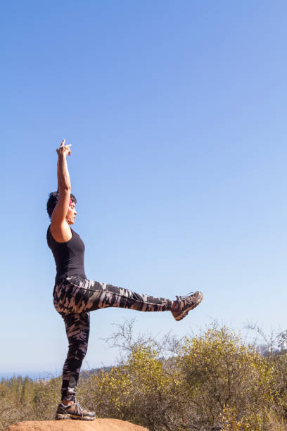 istock Mature Woman doing pilates exercises outsite 1222623532