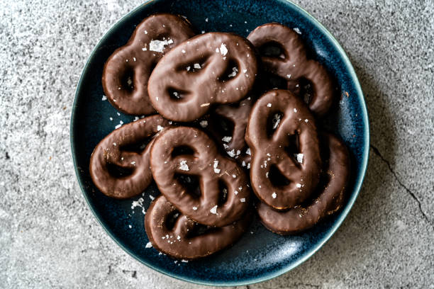 istock Dark Bitter Chocolate Covered Pretzels with Sea Salt. 1222626042