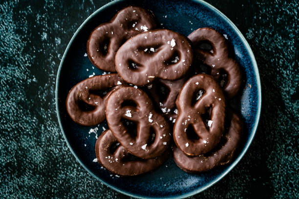 istock Dark Bitter Chocolate Covered Pretzels with Sea Salt. 1222626110