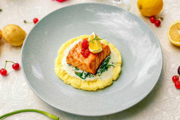 istock fried fish with mashed potatoes and cream sauce 1222626196