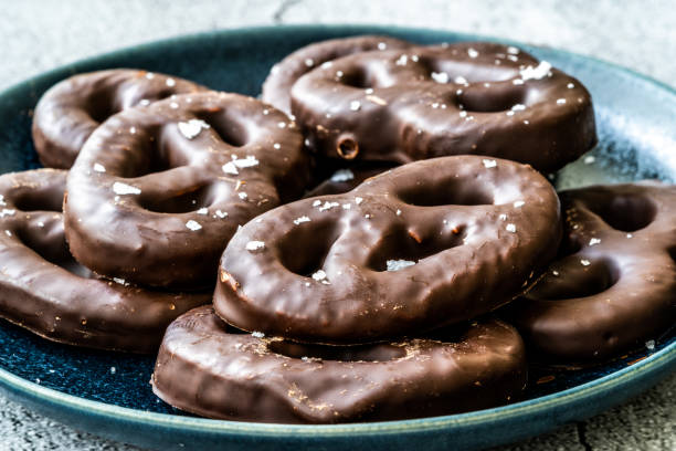 istock Dark Bitter Chocolate Covered Pretzels with Sea Salt. 1222626324