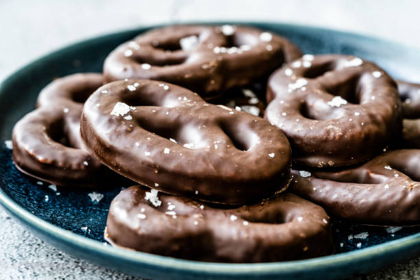 istock Dark Bitter Chocolate Covered Pretzels with Sea Salt. 1222626343