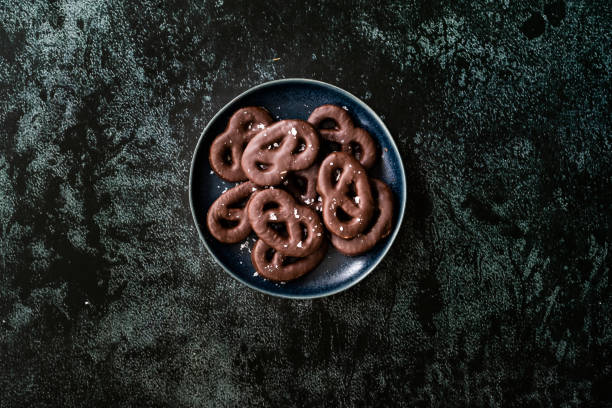 istock Dark Bitter Chocolate Covered Pretzels with Sea Salt. 1222626562