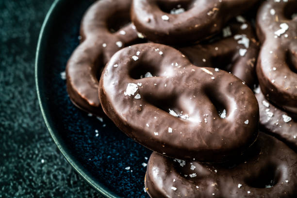istock Dark Bitter Chocolate Covered Pretzels with Sea Salt. 1222626649