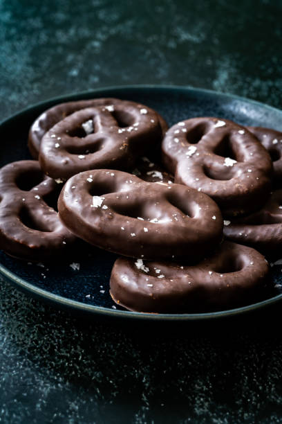 istock Dark Bitter Chocolate Covered Pretzels with Sea Salt. 1222627307