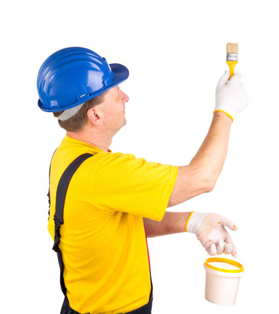 istock Worker with a bucket of paint and a brush. 1222632900