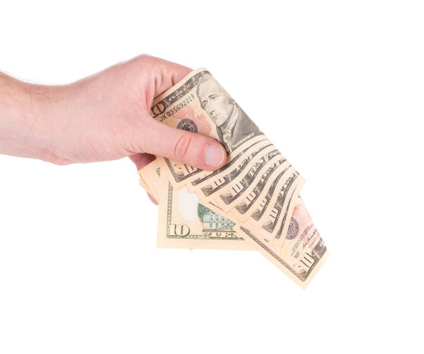 istock Hand holds american dollar bills. 1222632916
