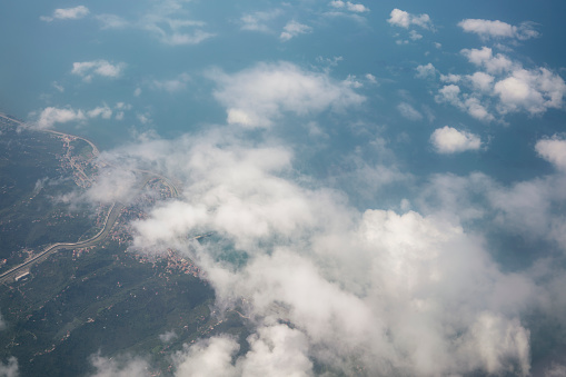 Aerial view of Black Sea Coast Above Clouds. Airplane flying over Giresun to Trabzon above clouds.