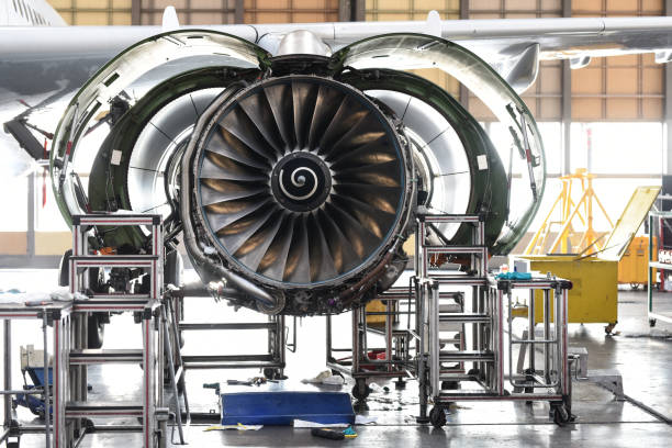 Aircraft Jet engine maintenance in airplane hangar stock photo