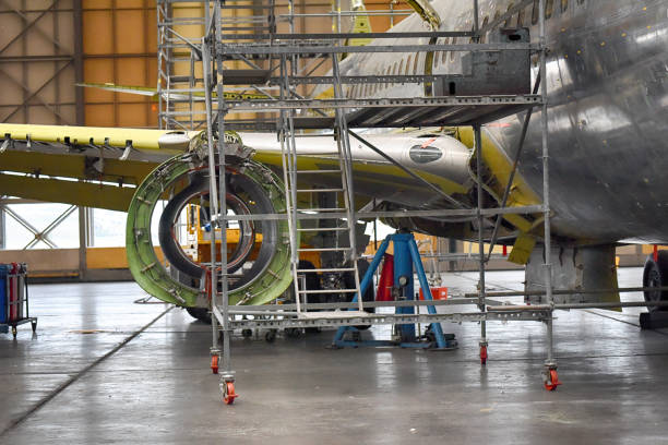 Aircraft maintenance in airplane hangar