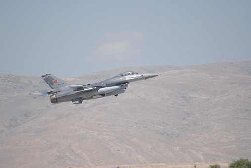 Konya, Turkey – June 26, 2019: Turkish Air Force F-16 jet fighter at takeoff from an air base during the Anatolian Eagle military exercise in the central Anatolian city of Konya