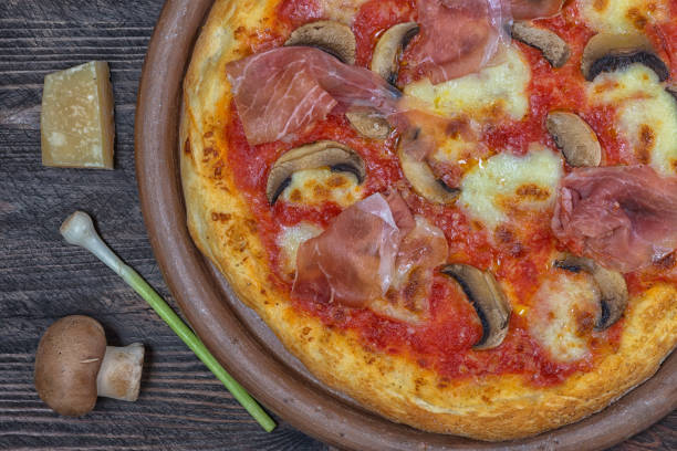 istock Pizza proscuitto funghi parmigiano chorizo garlic 1222639665