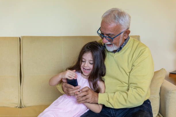 istock A Senior Man is Interested in Learning to Use a Digital Tablet. 1222640630