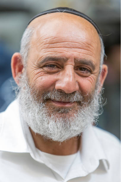 Israeli jewish senior man portrait with yarmulke looking at the camera in Jerusalem Old City, Israel Jerusalem, Israel, April 29, 2019: Israeli jewish senior man portrait with yarmulke looking at the camera in Jerusalem Old City, Israel hasidism photos stock pictures, royalty-free photos & images