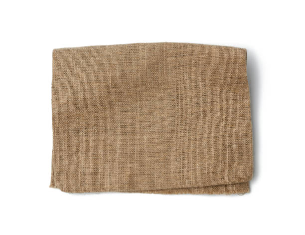 istock brown burlap fragment isolated on white background 1222641969