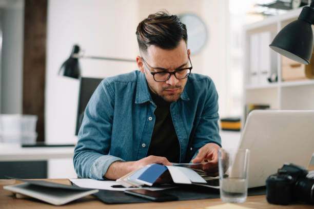 istock Handsome businessman working on lap top. 1222642095