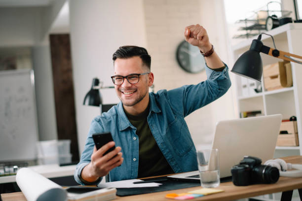 istock Handsome businessman working on lap top. 1222642179