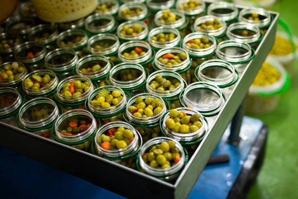 istock Glass cans filled with marinated olives 1222643029