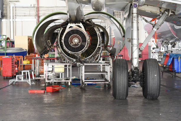 istock Aircraft Jet engine maintenance in airplane hangar 1222643099