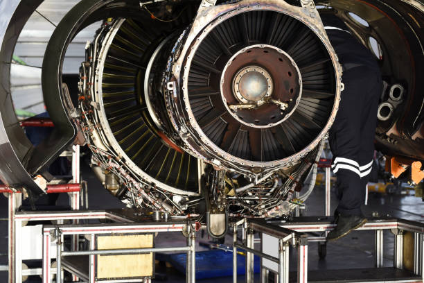 istock Jet engine maintenance in airplane hangar 1222644903