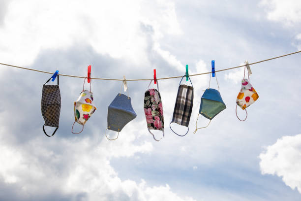 Colorful community masks on clothesline