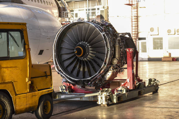 istock Jet engine maintenance in airplane hangar 1222647483