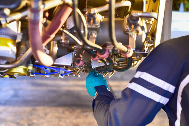 istock Aircraft engineer repairing and maintaining an airplane jet engine 1222648154