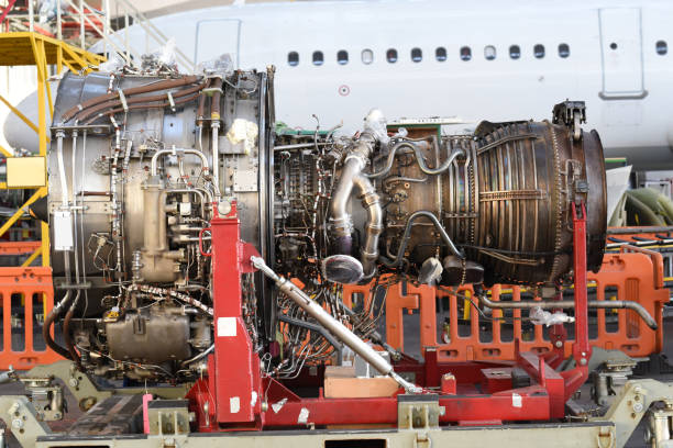 istock Jet engine maintenance in airplane hangar 1222648312