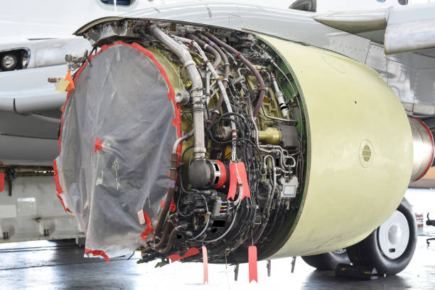 istock Aircraft Jet engine maintenance in airplane hangar 1222649690