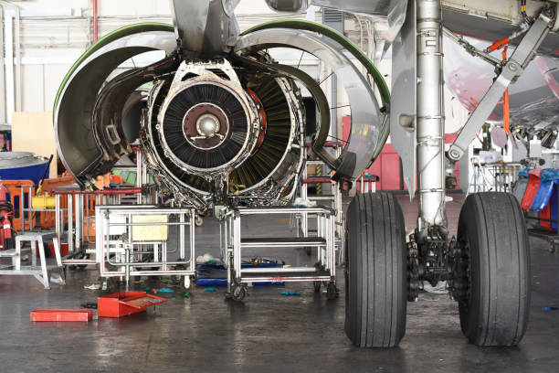 istock Aircraft maintenance in airplane hangar 1222650740