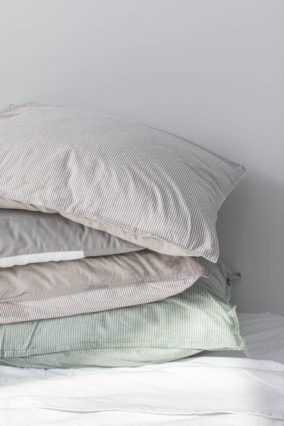 istock Stack of Pillows in Pillow Cases Made of Natural Materials 1222652379