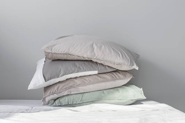 istock Stack of Pillows in Pillow Cases Made of Natural Materials 1222652385